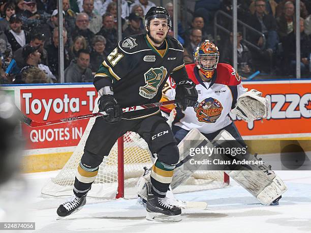 Chandler Yakimowicz of the London Knights looks for a shot to tip in front of Devin Williams of the Erie Otters during Game Three of the OHL Western...