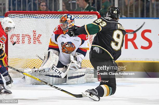 Mitchell Marner of the London Knights drills a shot past Devin Williams of the Erie Otters during Game Three of the OHL Western Conference Final on...