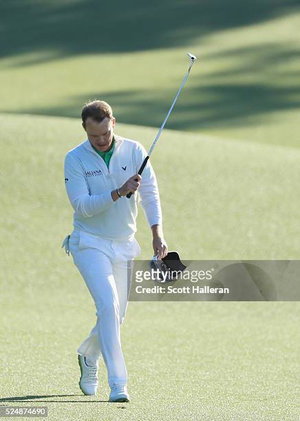 Danny Willett of England waves to the gallery on the 18th hole during the final round of the 2016 Masters Tournament at the Augusta National Golf...