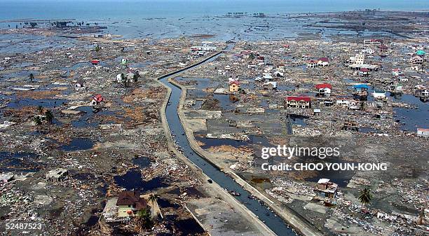 Aerial file photo shows a coastal area of Banda Aceh, 05 January 2005, two weeks after a powerful tsunami hit the region on December 26 2004,...