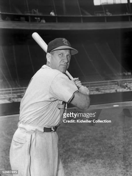 Outfielder Enos Slaughter of the St. Louis Cardinals poses for portrait prior to a 1951 season game against the New York Giants at the Polo Grounds...