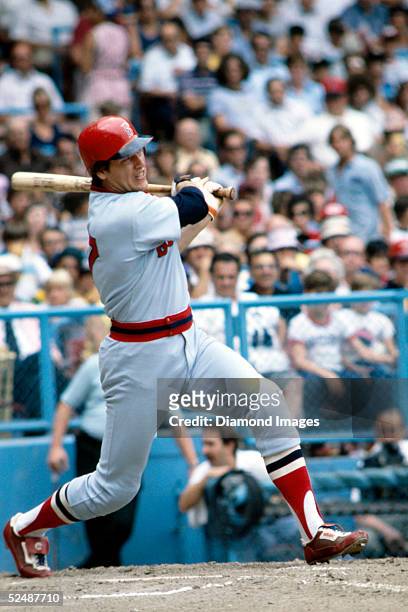 Catcher Carlton Fisk of the Boston Red Sox makes a hit during a 1978 season game against the Cleveland Indians at Municipal Stadium in Cleveland,...