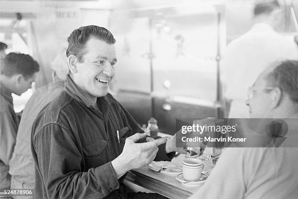 Customer in conversation at Johnny's Diner in Somerville, New Jersey, 1950.