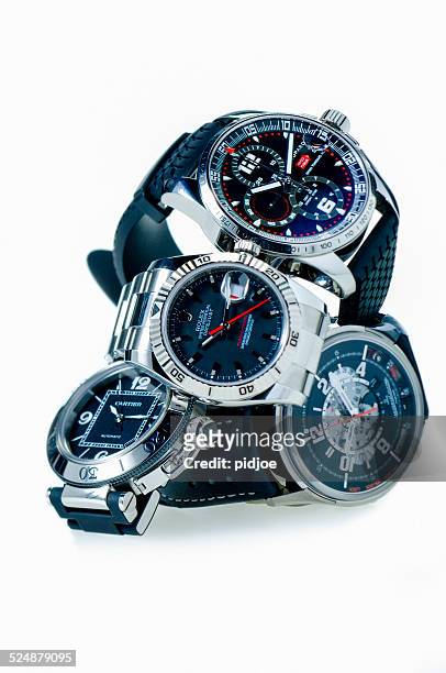 chopard, rolex, cartier and jaeger lecoultre luxury swiss wristwatches - luxury watches stock pictures, royalty-free photos & images