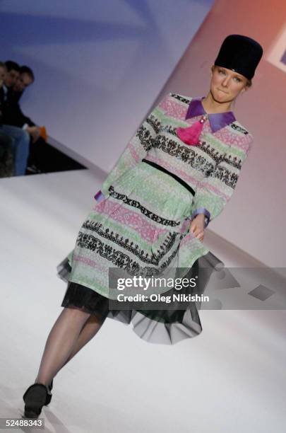 Model walks down the runway to introduce the new collection by Russian designer Elena Teplitskaya during the Moscow Fashion Week March 28, 2005 in...