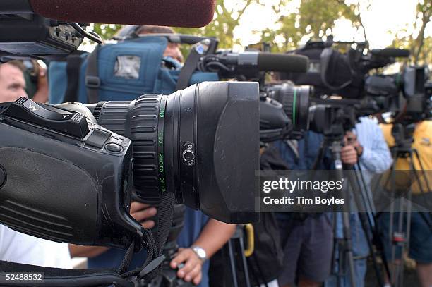 News crews with television cameras record a press conference by Michael Schiavo's attorney, Geroge Felos, near his office March 28, 2005 in Dunedin,...