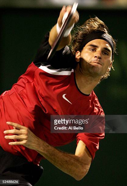 Roger Federer of Switzerland serves to Mariano Zabaleta of Argentina during the NASDAQ-100 Open at the Crandon Park Tennis Center on March 28, 2005...