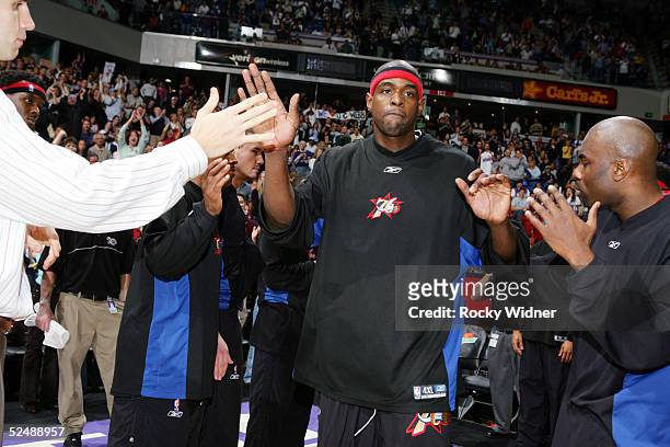 Chris Webber of the Philadelphia 76ers gets introduced to the ARCO arena crowd for the first time as an opponent against the Sacramento Kings on...