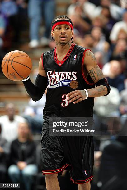 Allen Iverson of the Philadelphia 76ers brings the ball up court against the Sacramento Kings on March 28, 2005 at Arco Arena in Sacramento,...