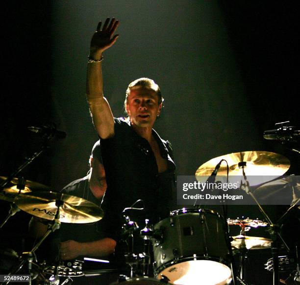 Musician Larry Mullen Jr. Of U2 performs on stage on the first night of their "Vertigo//2005" World Tour at the San Diego Sports Arena on March 28,...