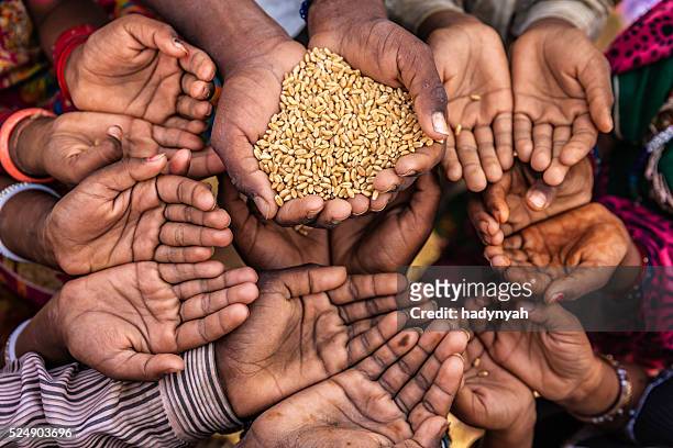 poor indian children asking for food, india - food staple stock pictures, royalty-free photos & images