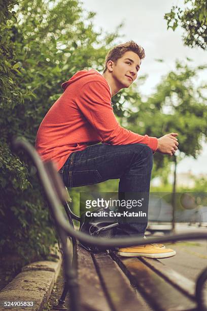 teenage boy in the city - 16 17 years stock pictures, royalty-free photos & images