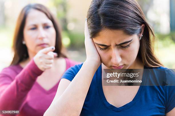 mother scolding her daughter after giving her a slap - giving a girl head stock pictures, royalty-free photos & images