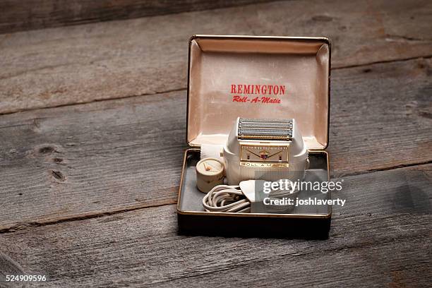 remington roll-a-matic electric shaver - electric razor stock pictures, royalty-free photos & images