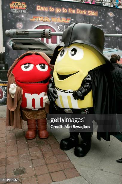 Characters unveil the new M&M Star Wars candy in Times Square March 29, 2005 in New York City.