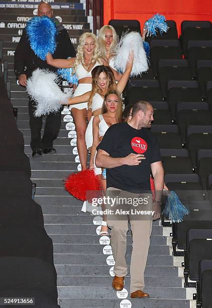 Tyson Fury turns up with cheer leaders as he arrives to meet Wladimir Klitschko to go head to head during a press conference at the Manchester Arena...