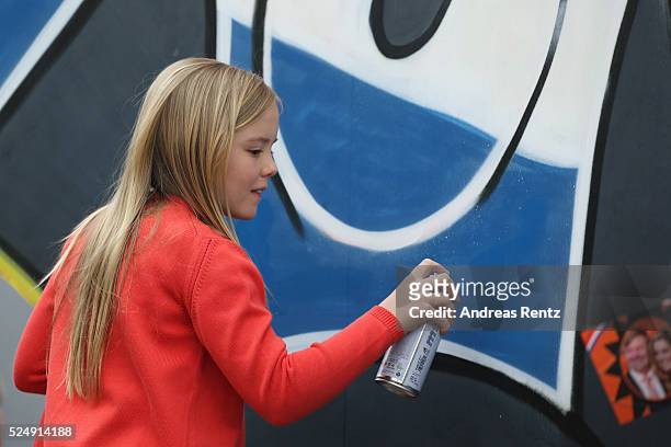 Princess Ariane of The Netherlands spray painting during King's Day , the celebration of the birthday of the Dutch King, on April 27, 2016 in Zwolle,...