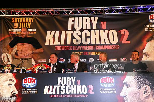 Tyson Fury faces the media bare chested during a press conference ahead of his fight with Wladimir Klitschko at the Manchester Arena on April 27,...