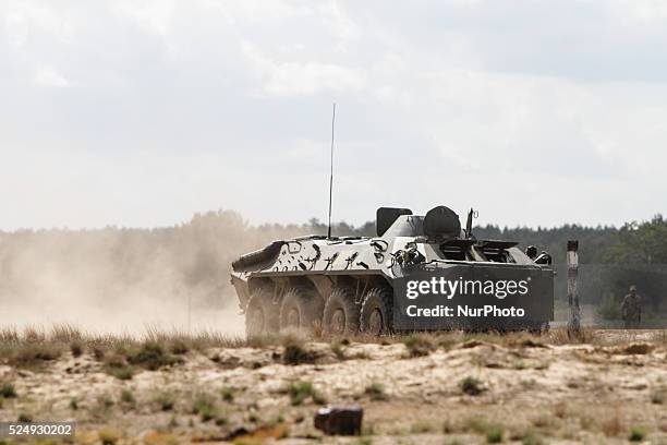 Soldiers drive 8x8 wheeled amphibious armoured personnel carrier BTR-80. Armed Forces of Ukraine continues to prepare soldiers in army recruit...