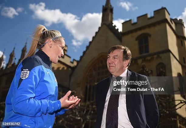 John Whittingdale, Secretary of State for Culture, Media and Sport talks to FA coach during the FA Girls' Football Week Event at Houses of Parliament...