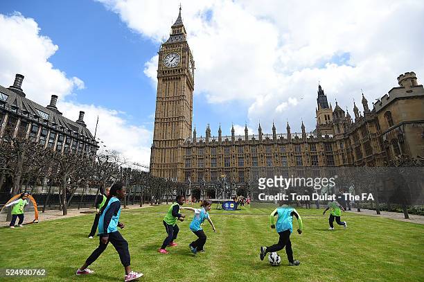 Girls take part in activities during the FA Girls' Football Week Event at Houses of Parliament on April 27, 2016 in London, England. .