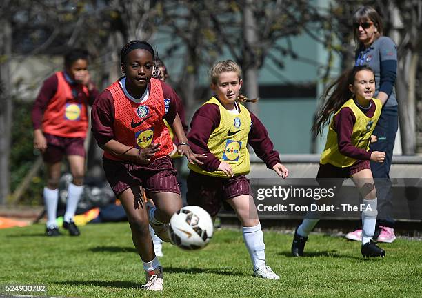 Girls take part in activities during the FA Girls' Football Week Event at Houses of Parliament on April 27, 2016 in London, England. .