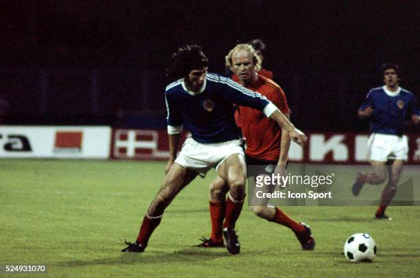 Ivica Surjak of Yugoslavia and Ruud Geels of Holland during the European Championship for the 3rd place between Holland and Yugoslavia in Stadium...