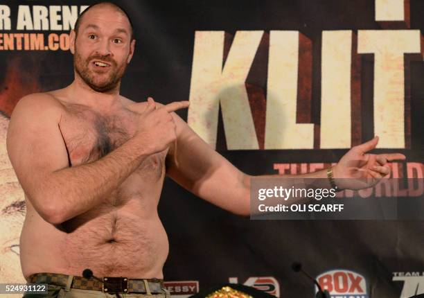 British heavyweight boxer Tyson Fury gestures during a press conference to publicise his forthcoming world heavyweight title fight against Ukranian...