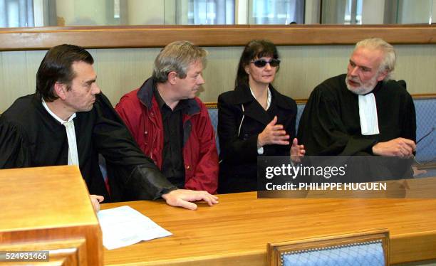 Jean-Claude Godrie , architecte de 57 ans, et son épouse Chantal patientent aux côtés de leurs avocats respectifs, Me Frank Berton et Me Christian...