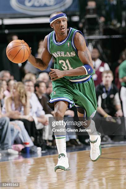 Jason Terry of the Dallas Mavericks moves the ball during the game against the Los Angeles Lakers at American Airlines Arena on March 10, 2005 in...
