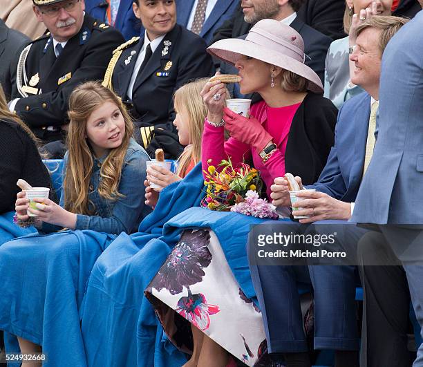 Princess Alexia, Princess Ariane, Queen Maxima and King Willem-Alexander of The Netherlands eat a sausage and have soup during celebrations marking...