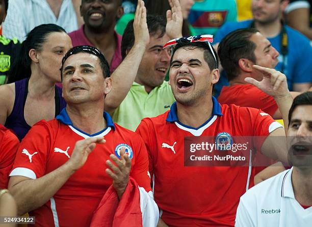 June: Chile supporters in the match between Spain and Chile in the group stage of the 2014 World Cup, for the group B match at the Beira Rio stadium,...