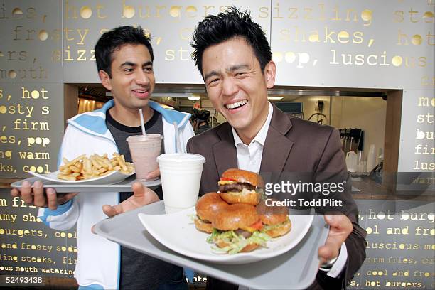 Actors Kal Penn and John Cho poses for a portrait while promoting their movie "Harold and Kumar Go To White Castle" at Pop's Burger in downtown New...