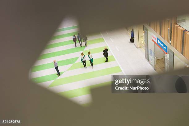 People are seen in the newly opened Zielony Arkady mall on Friday, one of the largest in Poland. The recently elected government set up a proposal...