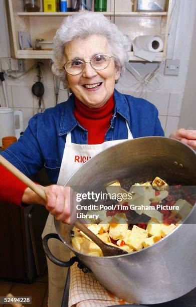 Etta Richardson mixes the ingredients needed to create the type of cake that is going to be baked for the upcoming wedding of Prince Charles and...