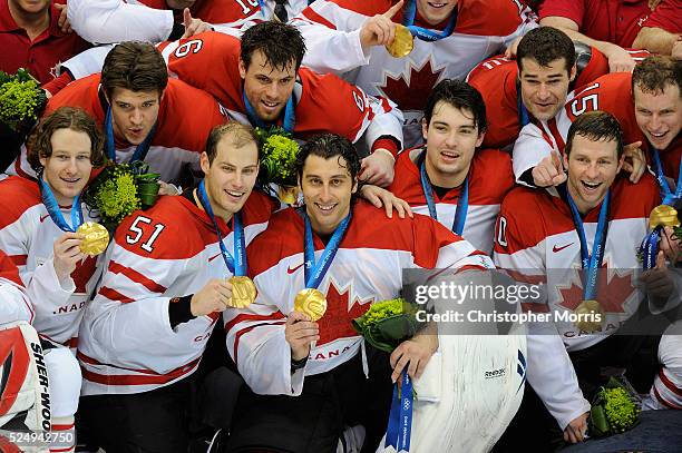 Canada's Ryan Getzlaf, Canada's Roberto Luongo, Canada's Brenden Morrow, 2nd row: Canada's Shea Weber, Canada's Dany Heatley celebrate after winning...