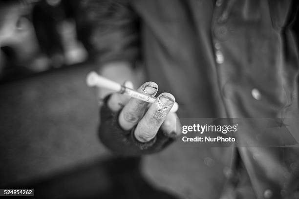 Year-old drug user says he injects drugs and huffs Aurolac paint, which is silver and has covered his fingers. Photo: Jodi Hilton/NurPhoto