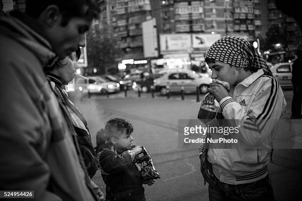 Four year-old girl watches as her older cousin huffs Aurolac paint. Of approximately 6000 homeless people living in Bucharest, about 1000 are...