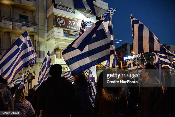 Supporters of the ultra nationalist Golden Dawn party demonstrate supporting the exile of illegal immigrants on World Day against Racism and Fascism...