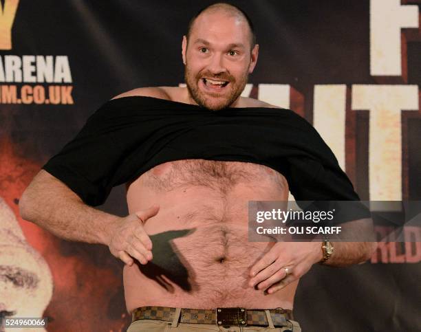 British heavyweight boxer Tyson Fury reacts during a press conference to publicise his forthcoming world heavyweight title fight against Ukranian...