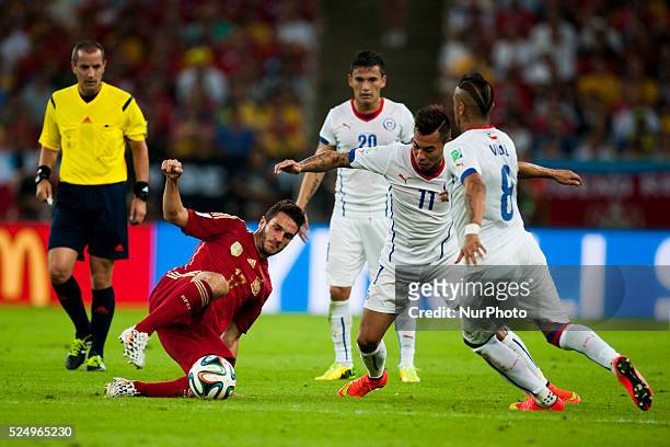 June: Koke, Vargas and Vidal in the match between Spain and Chile in the group stage of the 2014 World Cup, for the group B match at the Beira Rio...