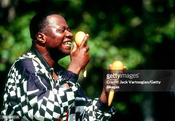 Congolese Soukous musician Papa Wemba performs onstage at SummerStage in Central Park, New York, New York, July 15, 1990.
