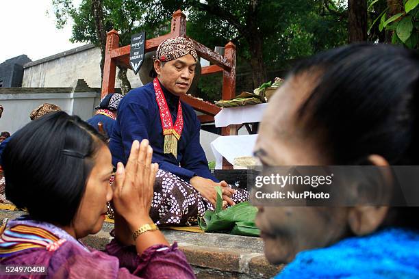 Resident ask for prayer during the procession &quot;nguras enceh&quot; at cemetery of the kings of Mataram, Yogyakarta, Indonesia on November 7,...