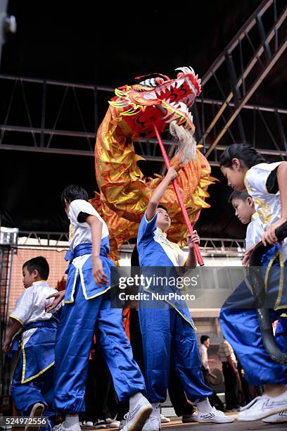 Kids perform the dragon dance during the Chinese Lunar New Year celebration in the 'Liberdade' neighborhood in Sao Paulo, Brazil on February 21,...