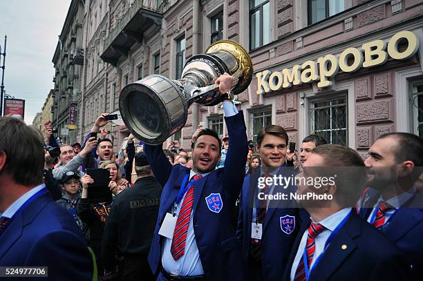 S Ilya Kovalchuk hold the Gagarin Cup during an event honouring HC SKA's victory in the 2014/15 Season Kontinental Hockey League in Saint-Petersburg,...