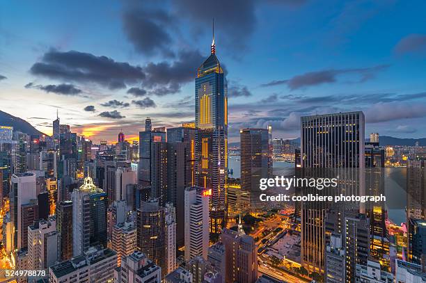 central business district of hong kong at night - wanchai stock pictures, royalty-free photos & images