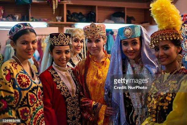 Portrait of actresses in traditional Uzbek costumes of 19 century after &quot;Instants of Eternity&quot; show in theater of historical costume...
