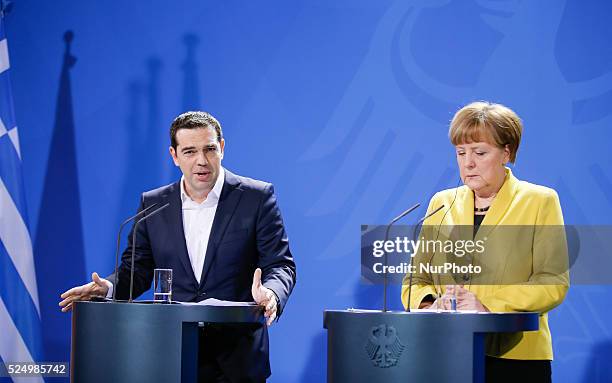 German Chancellor Angela Merkel and Greek Prime Minister Alexis Tsipras attend press conference at the Chancellery on March 23, 2015 in Berlin,...