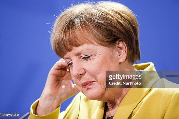German Chancellor Angela Merkel attends a press conference with Greek Prime Minister Alexis Tsipras upon his arrival for talks at the Chancellery on...