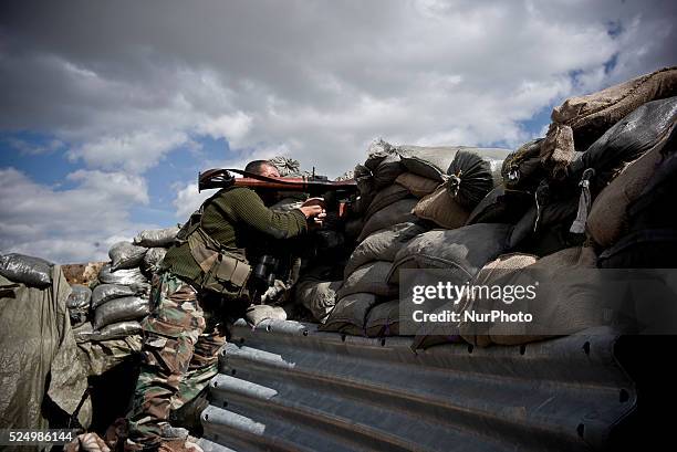 Members of the Kurdish Peshmerga forces, PKK and YPG fighting for retaking the Sinjar City from ISIS, on March 23, 2015.